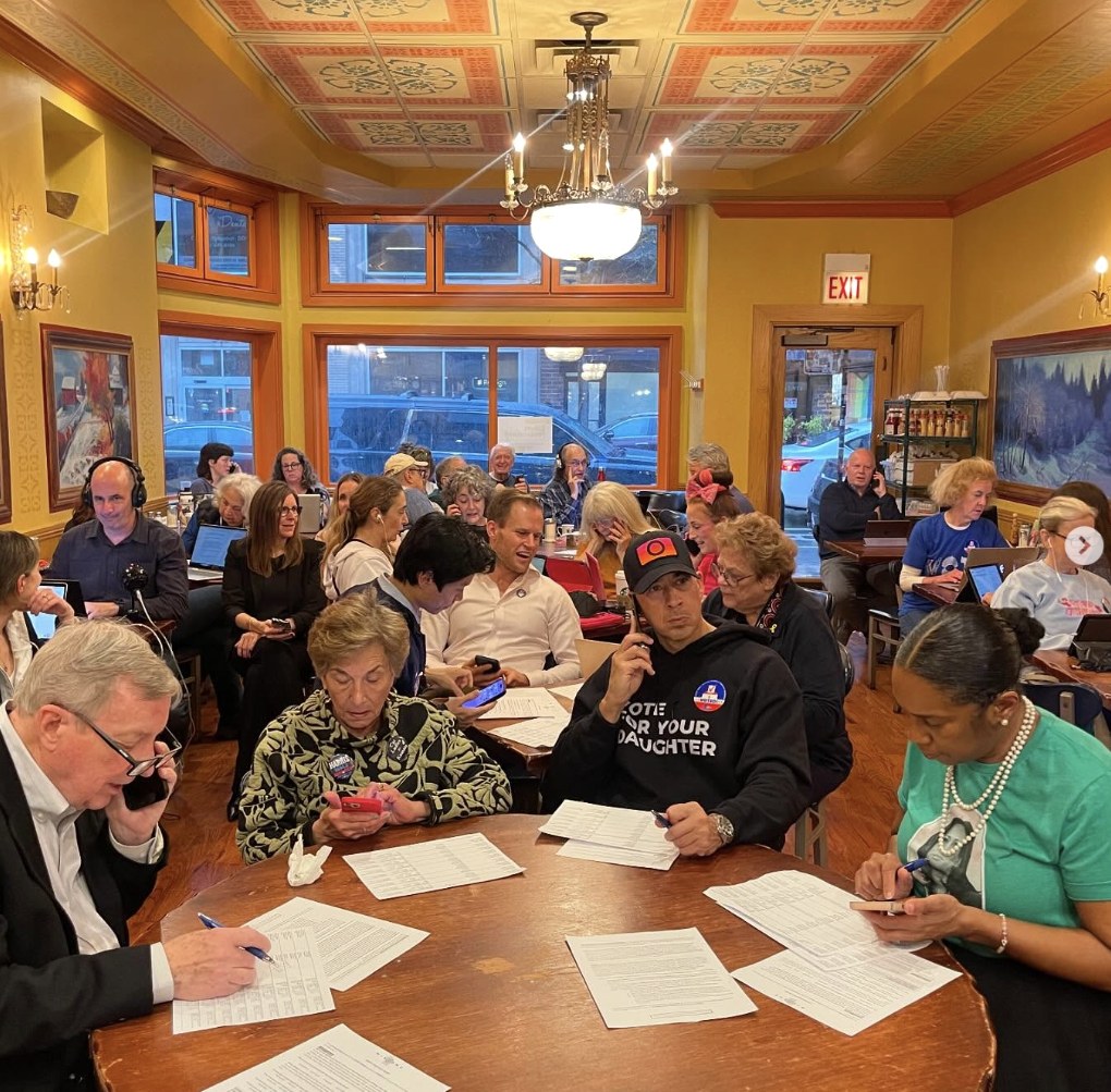 Volunteers making calls to swing-state voters
